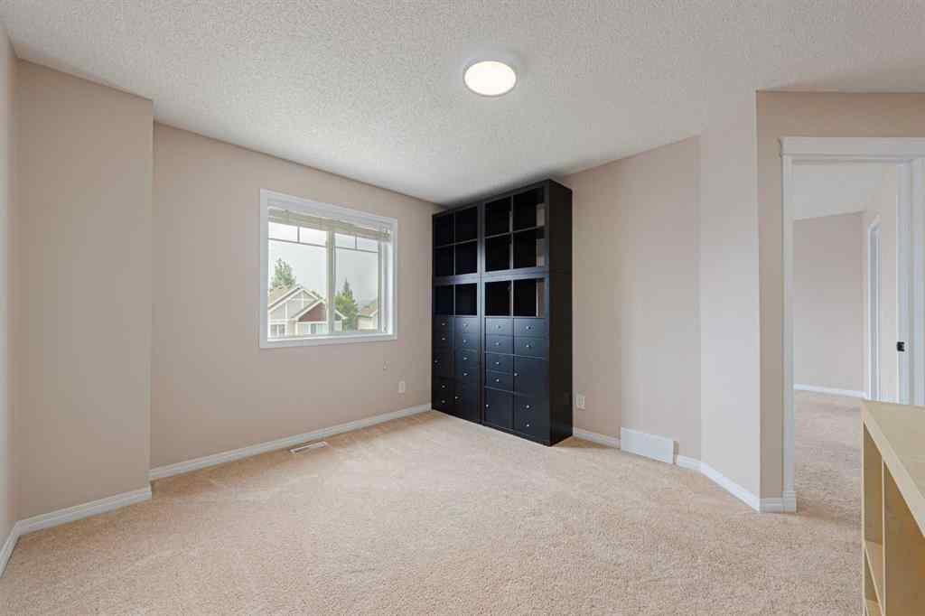 MLS® A2240089 - 184 Hidden Creek Gardens NW in Hidden Valley Calgary, Residential