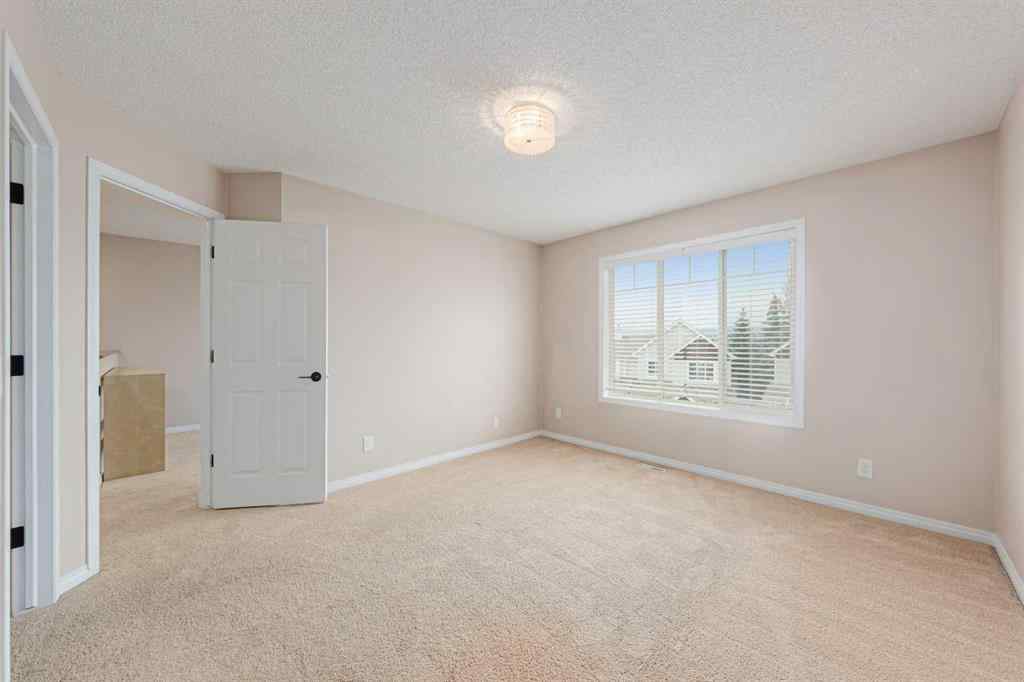 MLS® A2240089 - 184 Hidden Creek Gardens NW in Hidden Valley Calgary, Residential