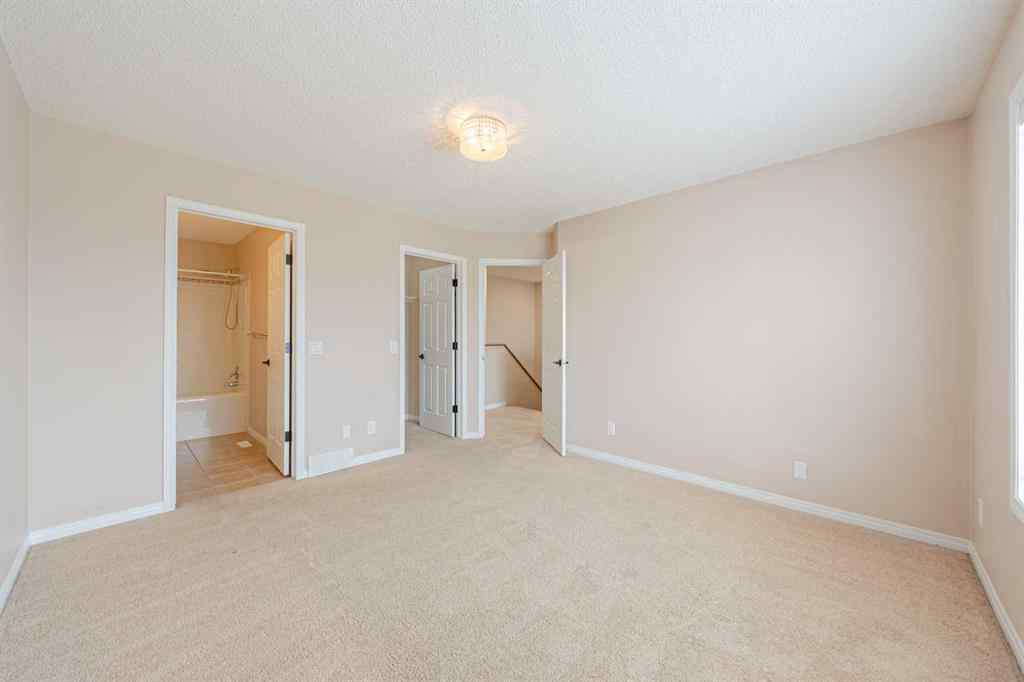 MLS® A2240089 - 184 Hidden Creek Gardens NW in Hidden Valley Calgary, Residential