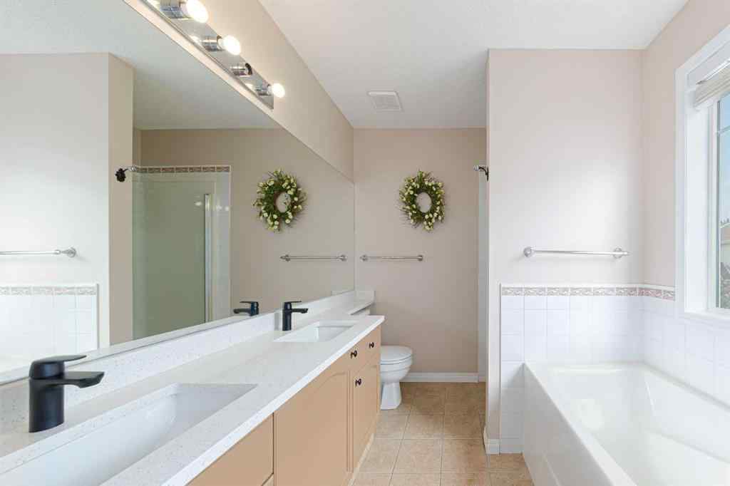 MLS® A2240089 - 184 Hidden Creek Gardens NW in Hidden Valley Calgary, Residential