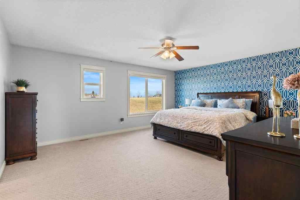 MLS® A2240092 - 409 Kinniburgh Boulevard  in Kinniburgh North Chestermere, Residential