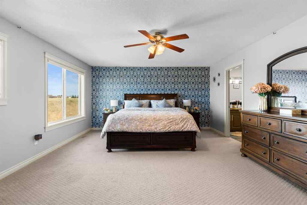 MLS® A2240092 - 409 Kinniburgh Boulevard  in Kinniburgh North Chestermere, Residential