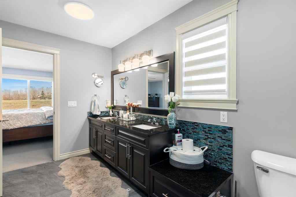 MLS® A2240092 - 409 Kinniburgh Boulevard  in Kinniburgh North Chestermere, Residential