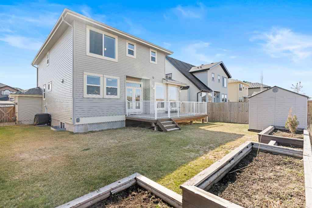 MLS® A2240092 - 409 Kinniburgh Boulevard  in Kinniburgh North Chestermere, Residential