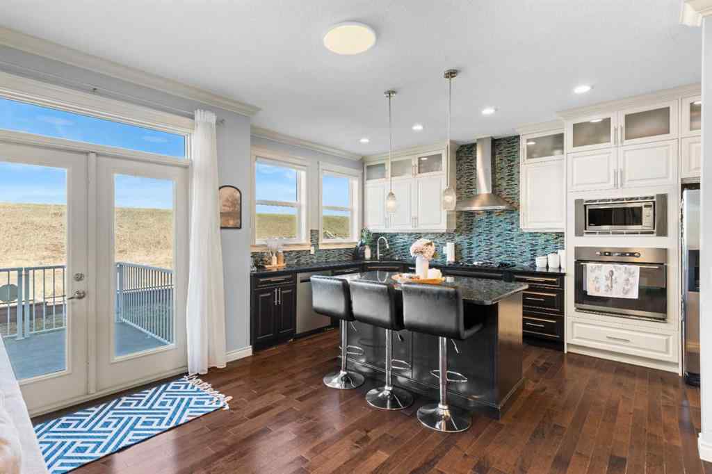 MLS® A2240092 - 409 Kinniburgh Boulevard  in Kinniburgh North Chestermere, Residential
