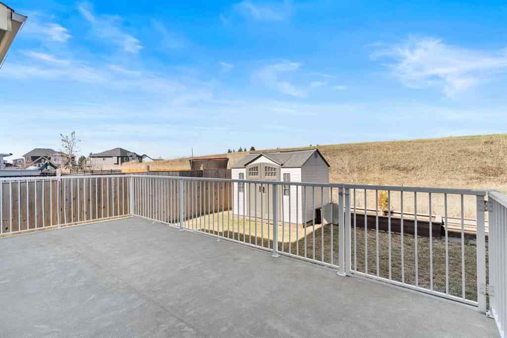 MLS® A2240092 - 409 Kinniburgh Boulevard  in Kinniburgh North Chestermere, Residential
