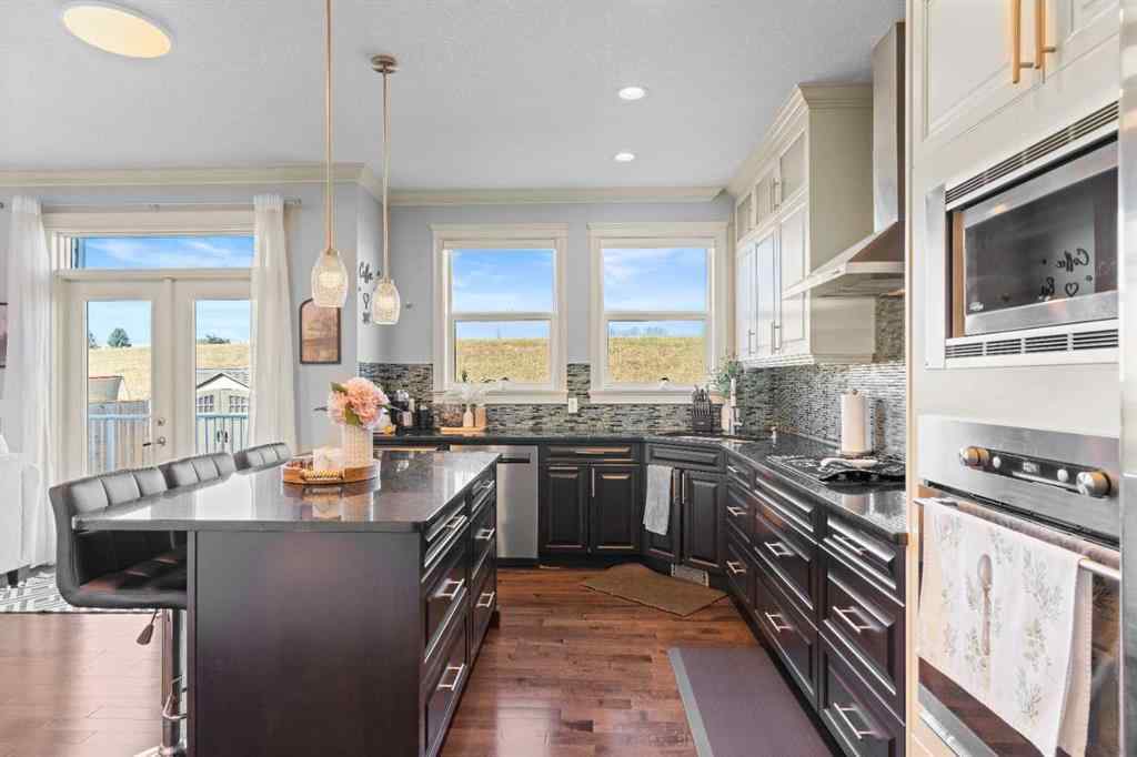 MLS® A2240092 - 409 Kinniburgh Boulevard  in Kinniburgh North Chestermere, Residential
