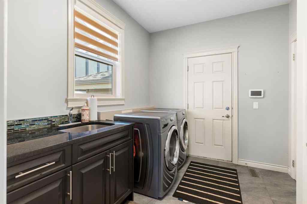 MLS® A2240092 - 409 Kinniburgh Boulevard  in Kinniburgh North Chestermere, Residential