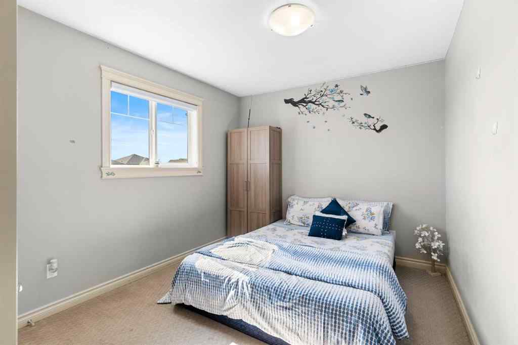 MLS® A2240092 - 409 Kinniburgh Boulevard  in Kinniburgh North Chestermere, Residential