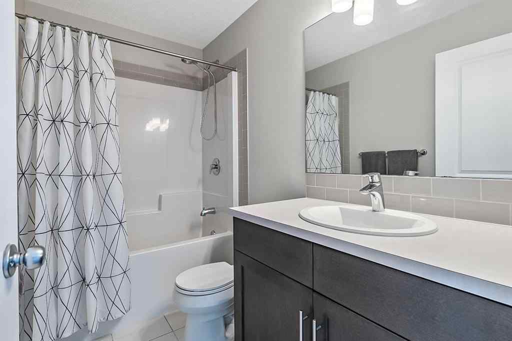 MLS® A2240100 - 28 BELMONT Terrace  in Belmont Calgary, Residential