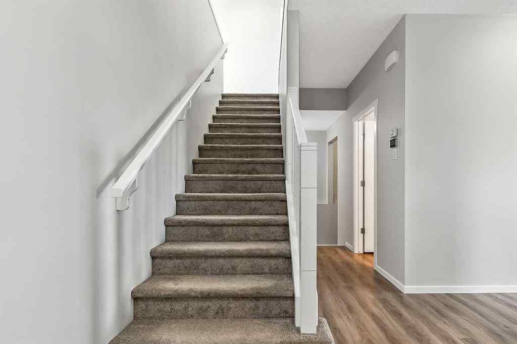 MLS® A2240100 - 28 BELMONT Terrace  in Belmont Calgary, Residential