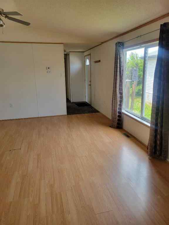 MLS® A2240125 - 9006 87 Avenue  in MH - Creekside Grande Prairie, Residential
