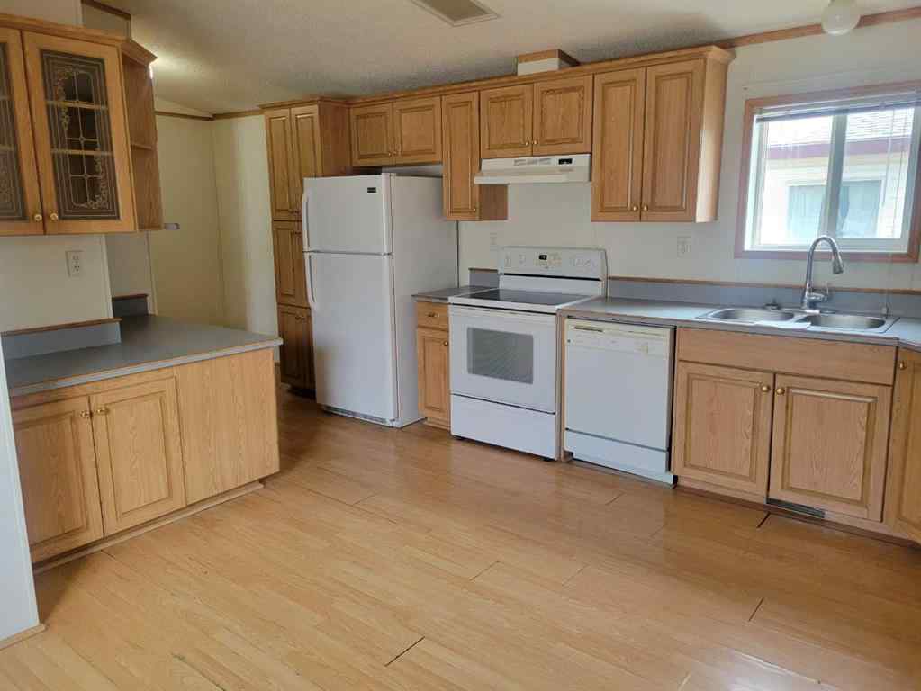 MLS® A2240125 - 9006 87 Avenue  in MH - Creekside Grande Prairie, Residential