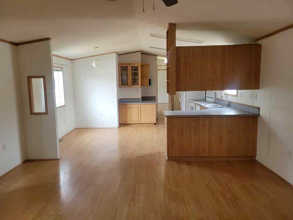 MLS® A2240125 - 9006 87 Avenue  in MH - Creekside Grande Prairie, Residential