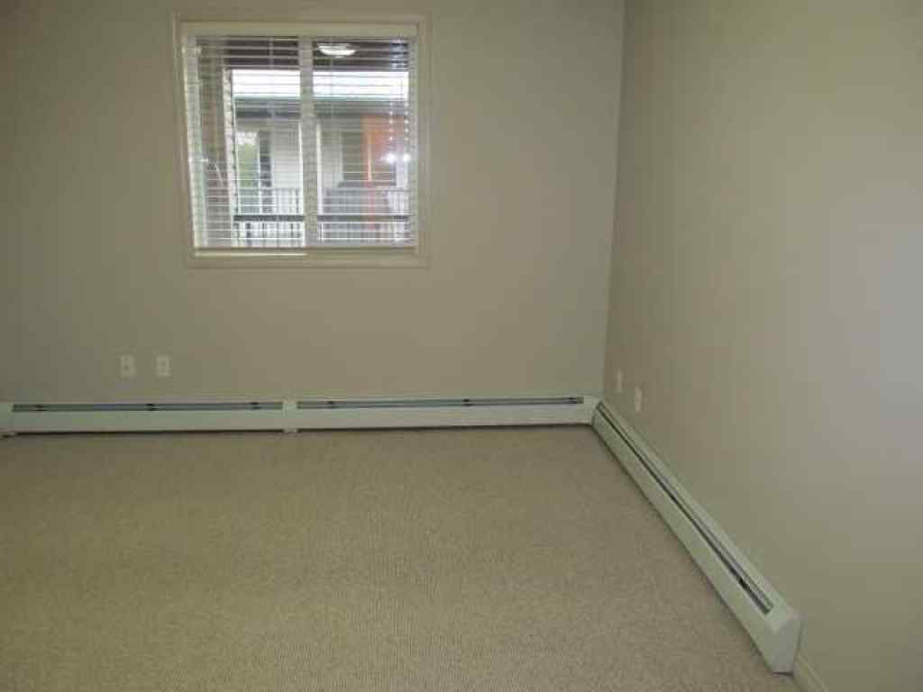 MLS® A2240137 - Unit #405 5601 KERRY WOOD Drive  in Riverside Meadows Red Deer, Residential