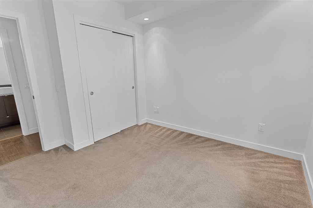 MLS® A2240203 - Unit #104 25 Aspenmont Heights SW in Aspen Woods Calgary, Residential