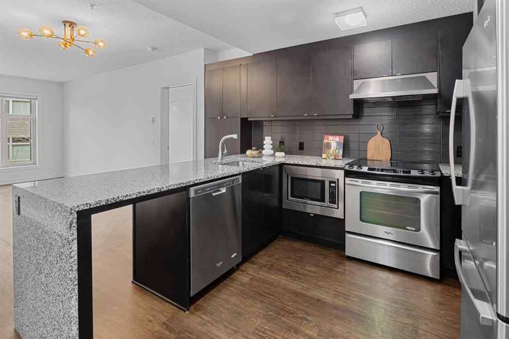MLS® A2240203 - Unit #104 25 Aspenmont Heights SW in Aspen Woods Calgary, Residential