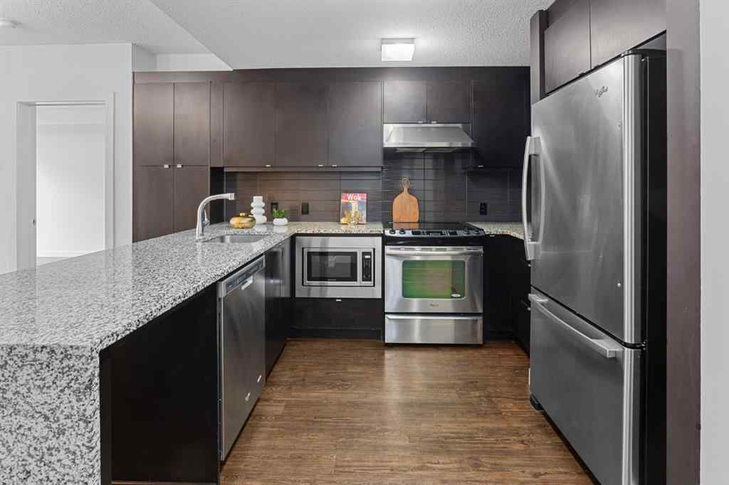 MLS® A2240203 - Unit #104 25 Aspenmont Heights SW in Aspen Woods Calgary, Residential