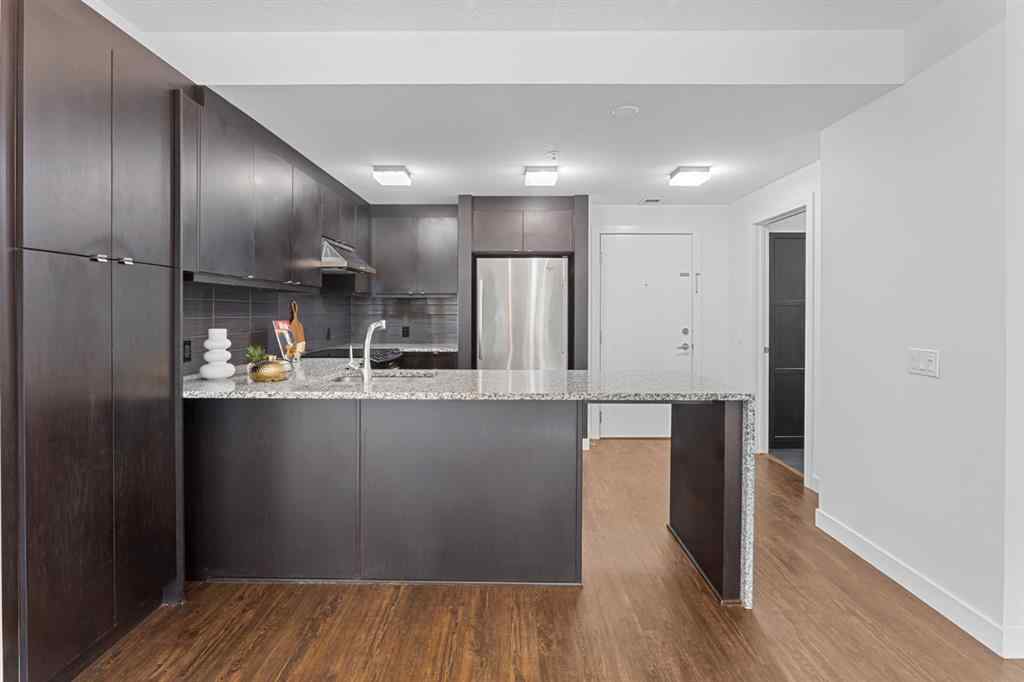 MLS® A2240203 - Unit #104 25 Aspenmont Heights SW in Aspen Woods Calgary, Residential