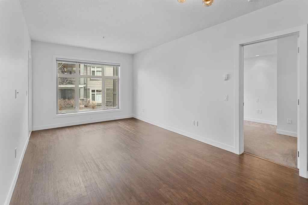 MLS® A2240203 - Unit #104 25 Aspenmont Heights SW in Aspen Woods Calgary, Residential