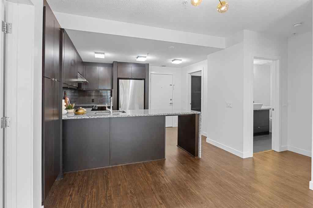 MLS® A2240203 - Unit #104 25 Aspenmont Heights SW in Aspen Woods Calgary, Residential