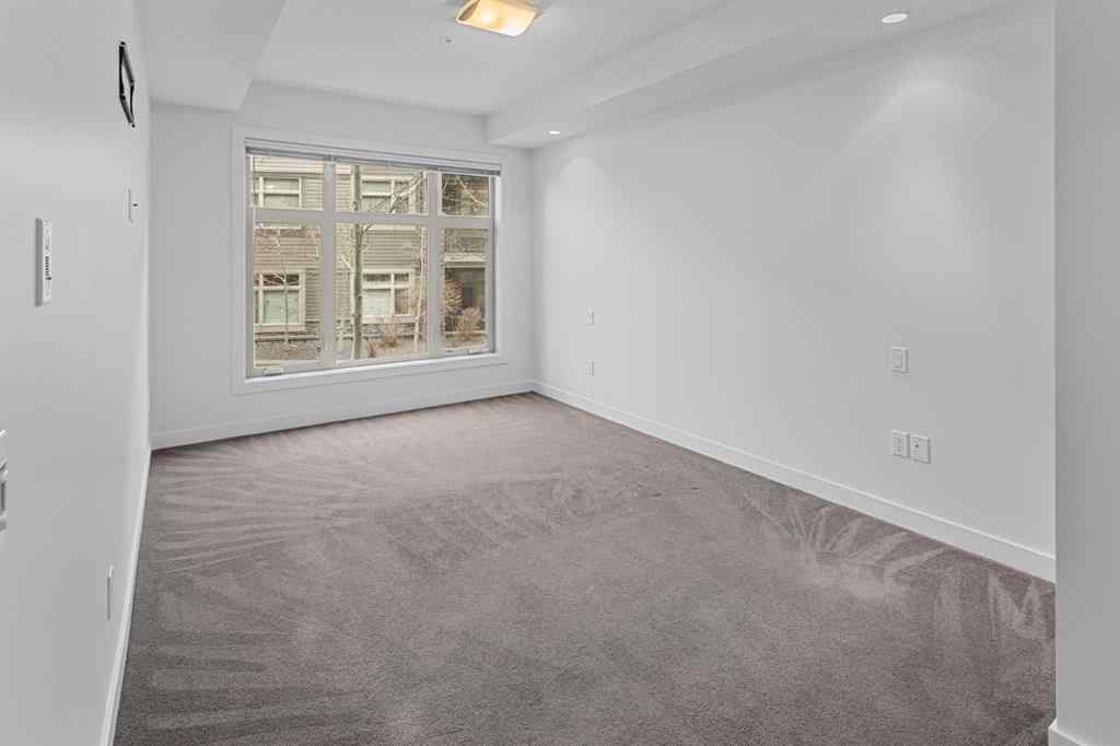MLS® A2240203 - Unit #104 25 Aspenmont Heights SW in Aspen Woods Calgary, Residential
