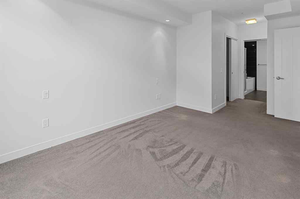 MLS® A2240203 - Unit #104 25 Aspenmont Heights SW in Aspen Woods Calgary, Residential