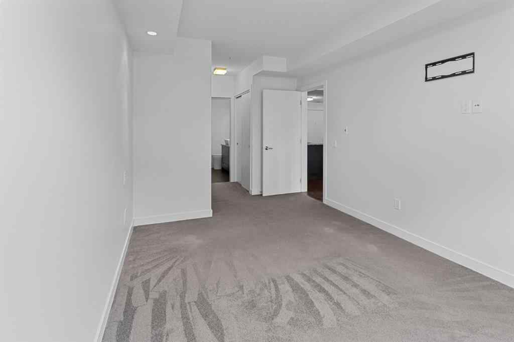 MLS® A2240203 - Unit #104 25 Aspenmont Heights SW in Aspen Woods Calgary, Residential