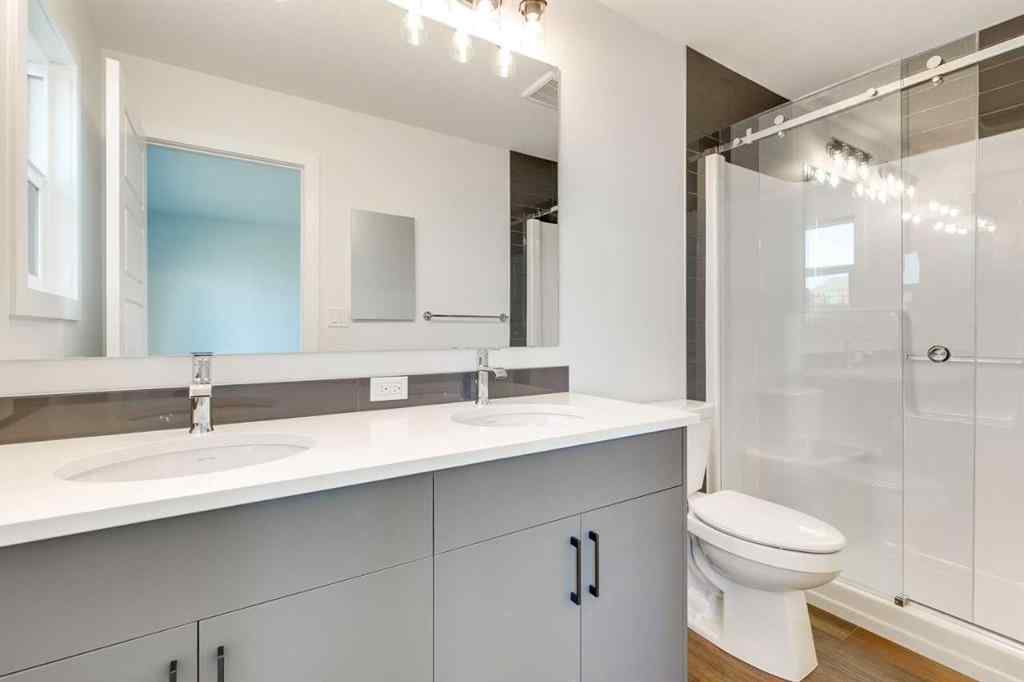 MLS® A2240213 - 74 Lewiston Way NE in Lewisburg Calgary, Residential