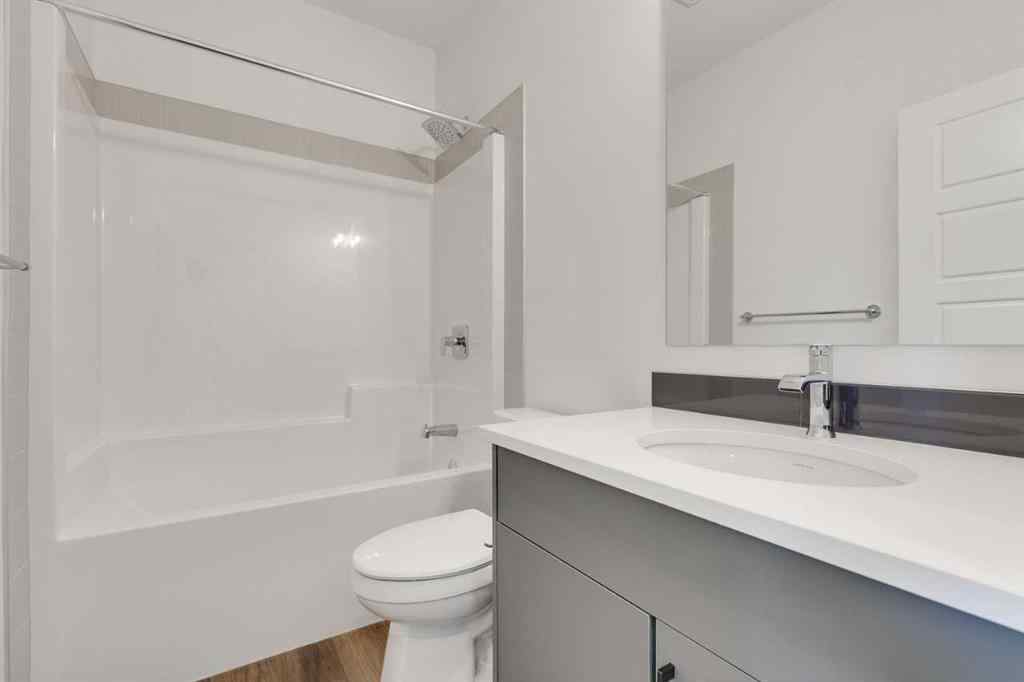 MLS® A2240213 - 74 Lewiston Way NE in Lewisburg Calgary, Residential