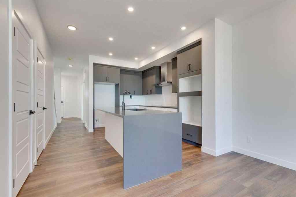 MLS® A2240213 - 74 Lewiston Way NE in Lewisburg Calgary, Residential