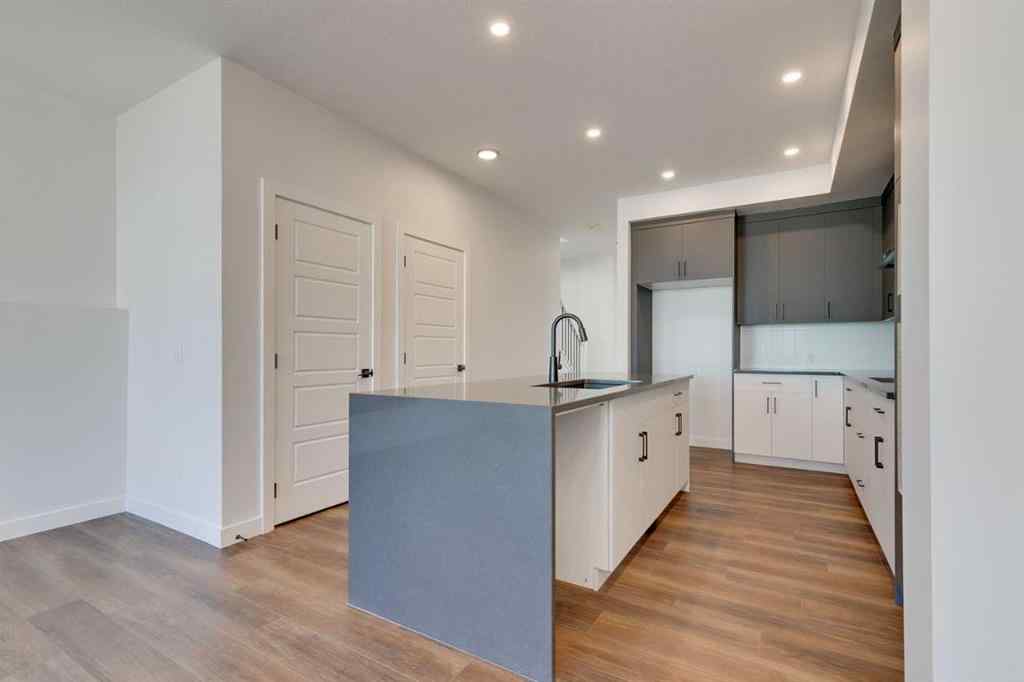 MLS® A2240213 - 74 Lewiston Way NE in Lewisburg Calgary, Residential