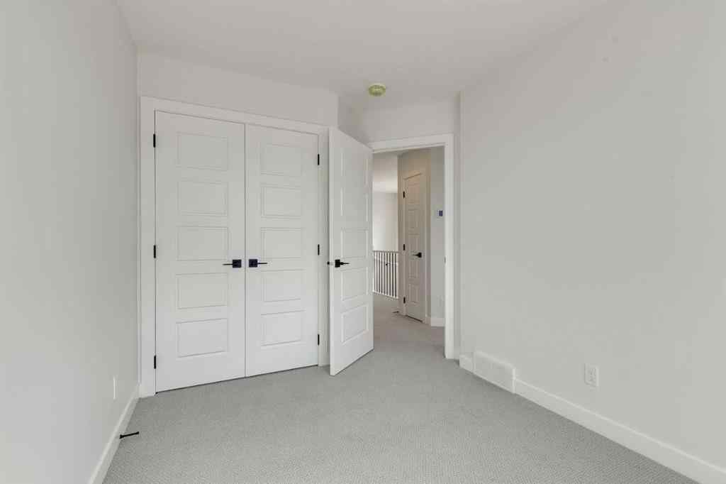 MLS® A2240213 - 74 Lewiston Way NE in Lewisburg Calgary, Residential