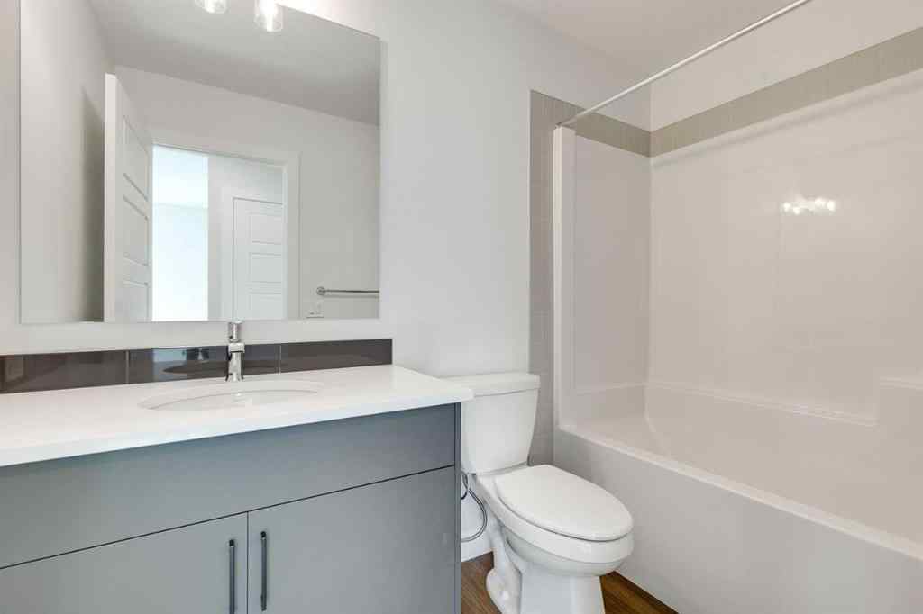 MLS® A2240213 - 74 Lewiston Way NE in Lewisburg Calgary, Residential