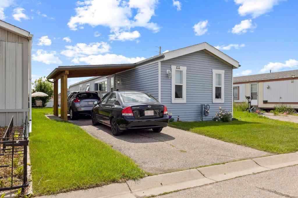 MLS® A2240269 - 122 Erin Woods Circle SE in Erin Woods Calgary, Residential
