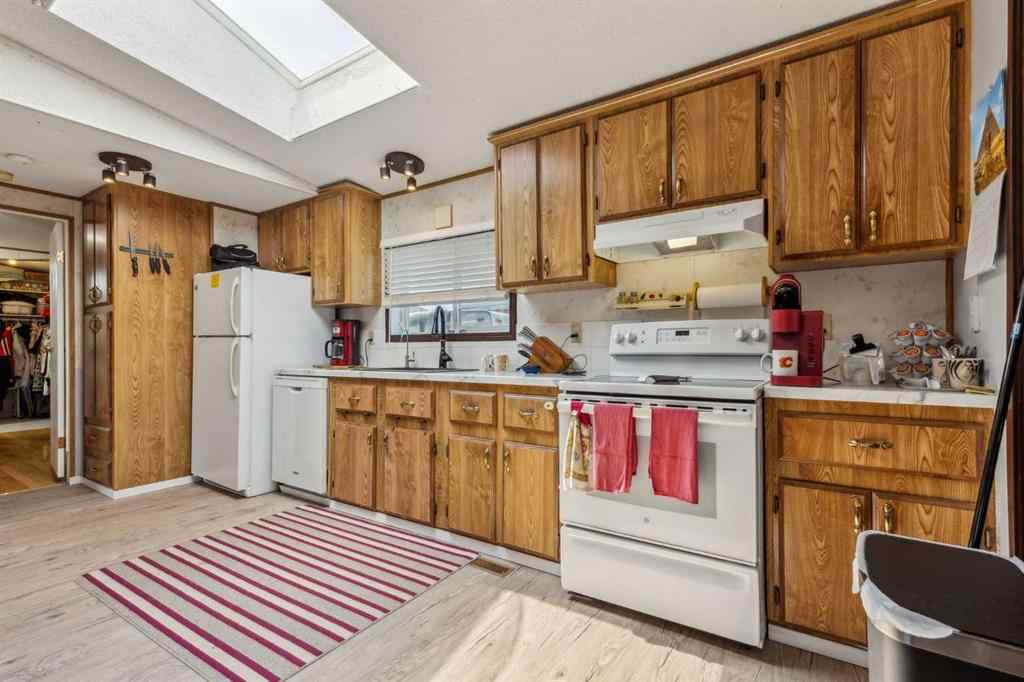MLS® A2240269 - 122 Erin Woods Circle SE in Erin Woods Calgary, Residential