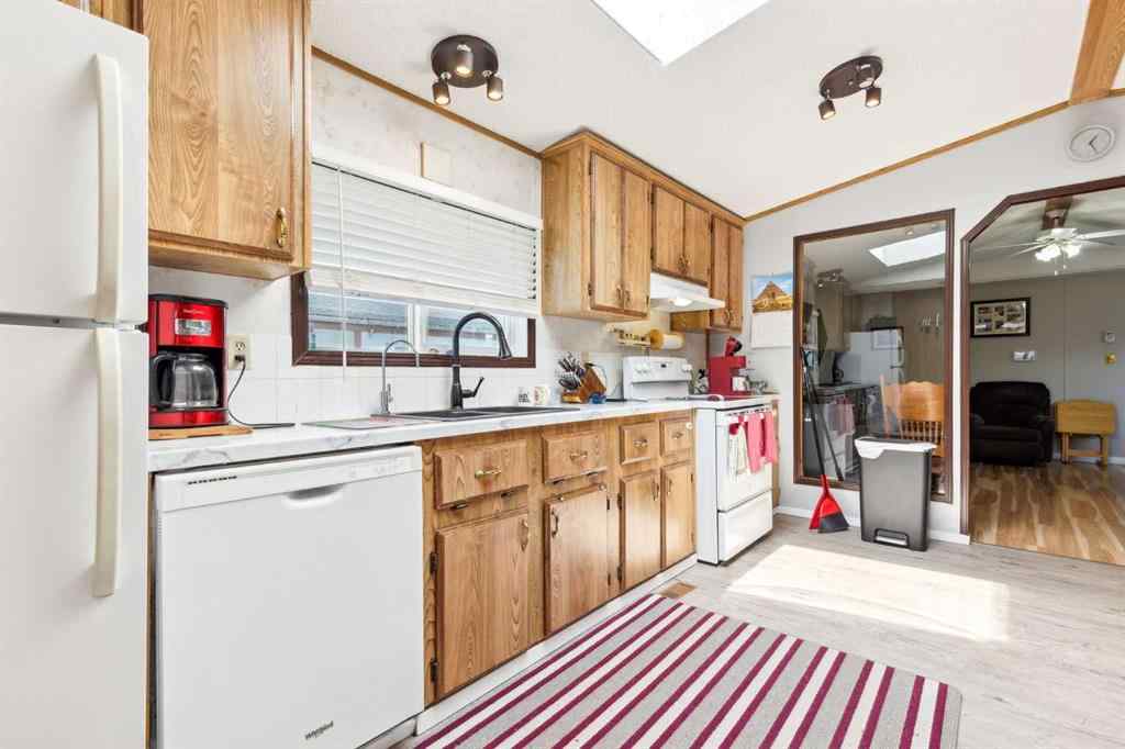 MLS® A2240269 - 122 Erin Woods Circle SE in Erin Woods Calgary, Residential