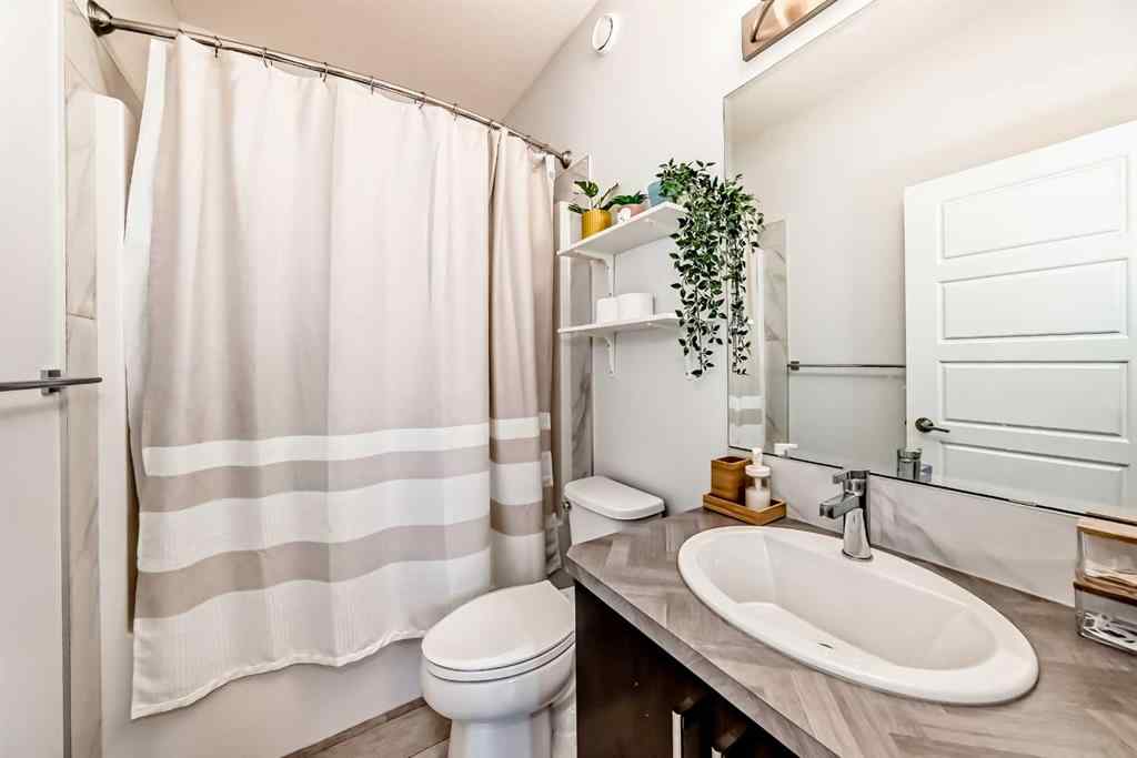 MLS® A2240271 - 144 Evanscrest Park NW in Evanston Calgary, Residential