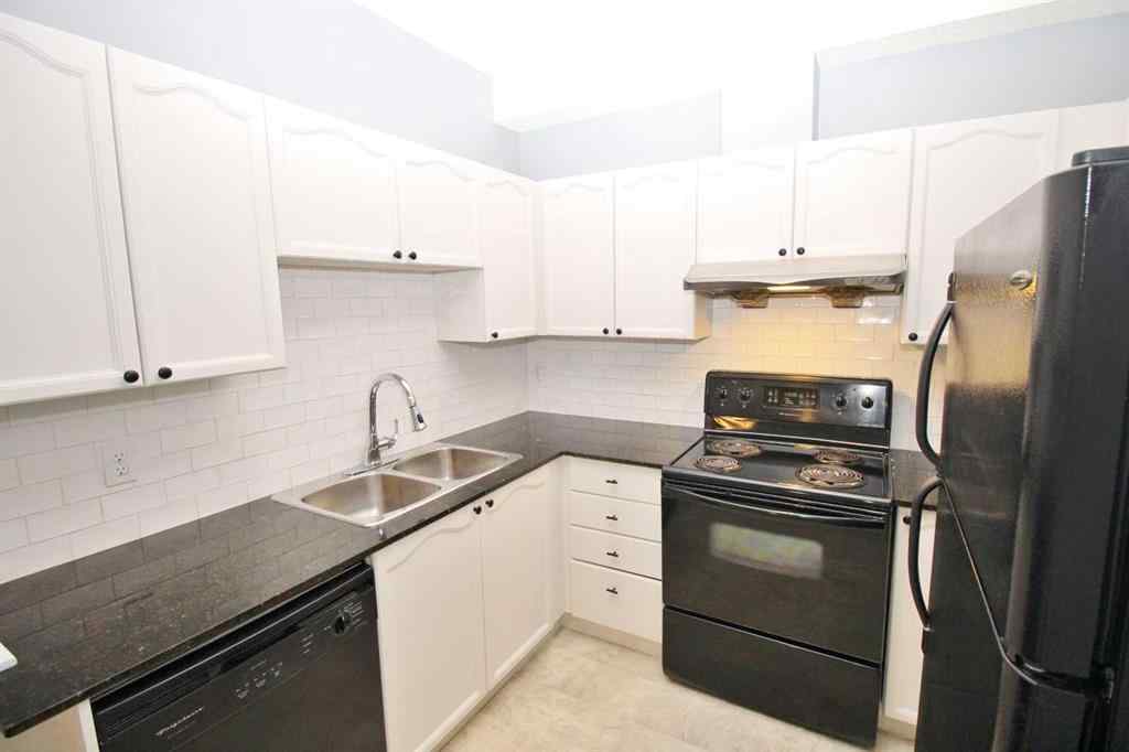 MLS® A2240286 - Unit #106 8 Prestwick Pond Terrace SE in McKenzie Towne Calgary, Residential