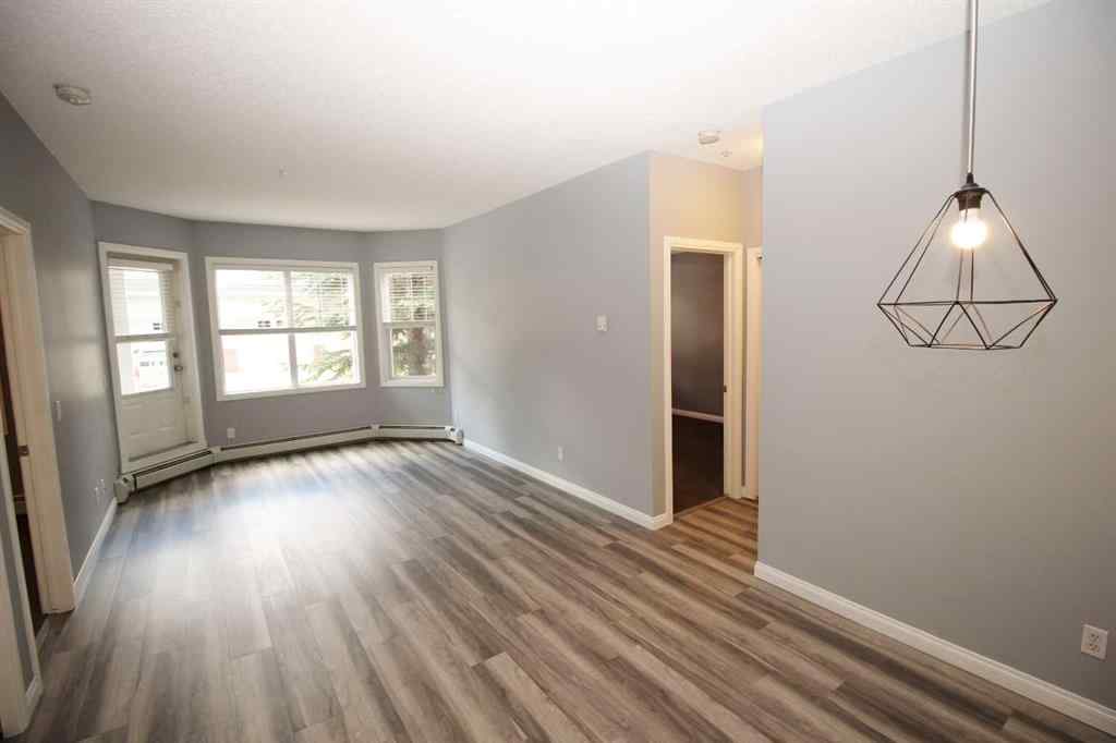 MLS® A2240286 - Unit #106 8 Prestwick Pond Terrace SE in McKenzie Towne Calgary, Residential