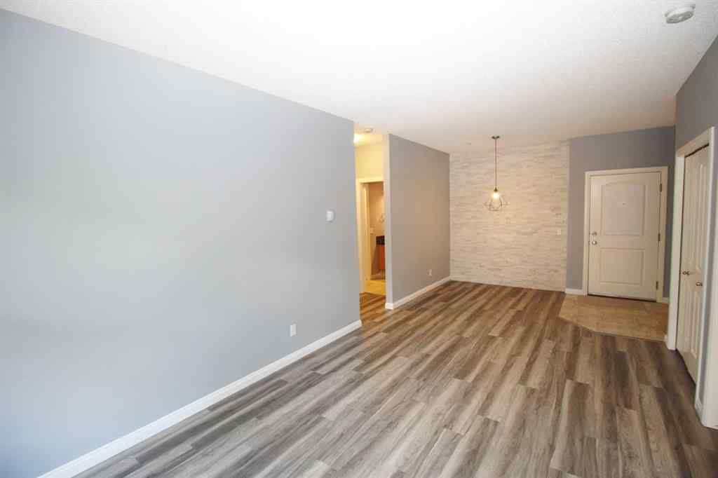 MLS® A2240286 - Unit #106 8 Prestwick Pond Terrace SE in McKenzie Towne Calgary, Residential