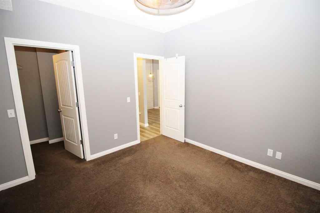 MLS® A2240286 - Unit #106 8 Prestwick Pond Terrace SE in McKenzie Towne Calgary, Residential