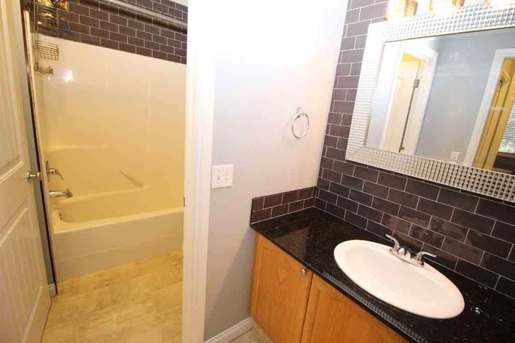 MLS® A2240286 - Unit #106 8 Prestwick Pond Terrace SE in McKenzie Towne Calgary, Residential
