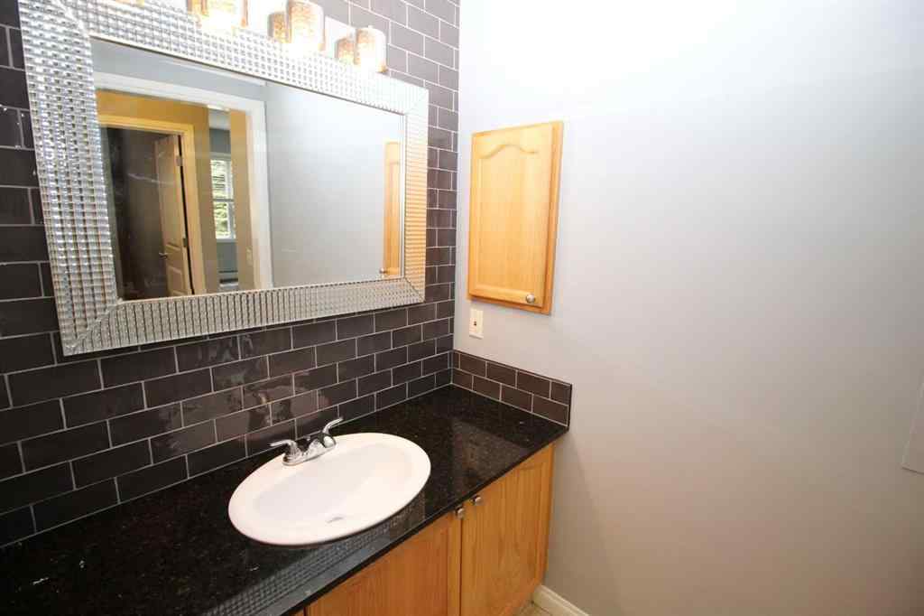 MLS® A2240286 - Unit #106 8 Prestwick Pond Terrace SE in McKenzie Towne Calgary, Residential