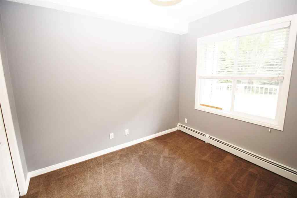 MLS® A2240286 - Unit #106 8 Prestwick Pond Terrace SE in McKenzie Towne Calgary, Residential