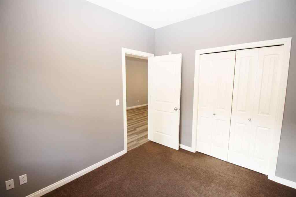 MLS® A2240286 - Unit #106 8 Prestwick Pond Terrace SE in McKenzie Towne Calgary, Residential