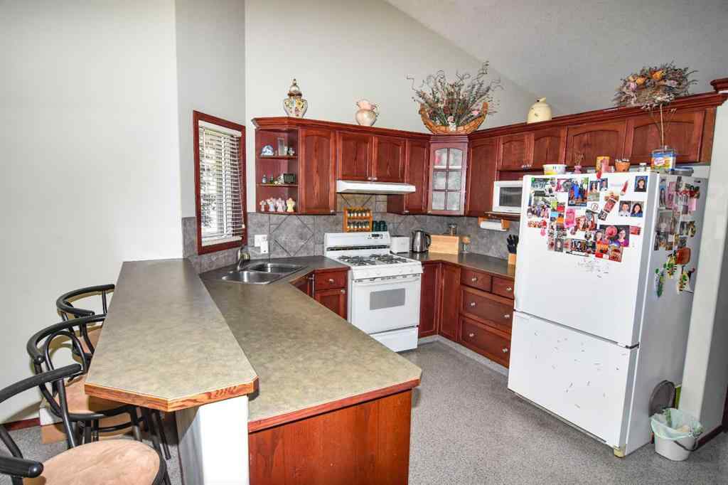MLS® A2240330 - 23 Aspen Creek Way  in Aspen Creek Strathmore, Residential