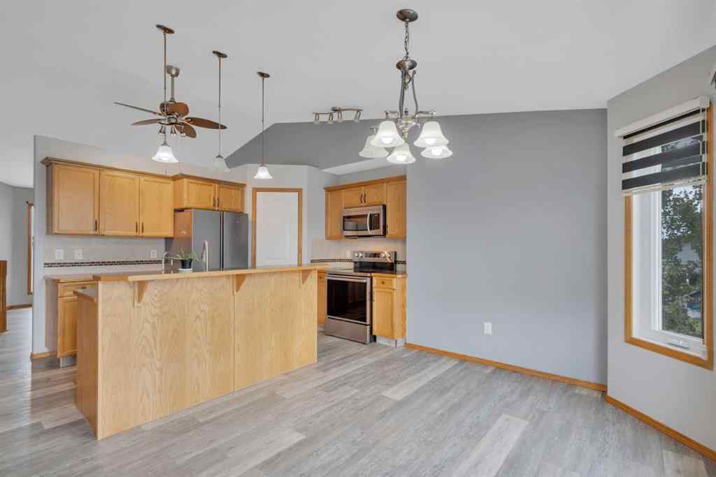 MLS® A2240334 - 6407 60 Street Close  in Meadowlark Estates Ponoka, Residential