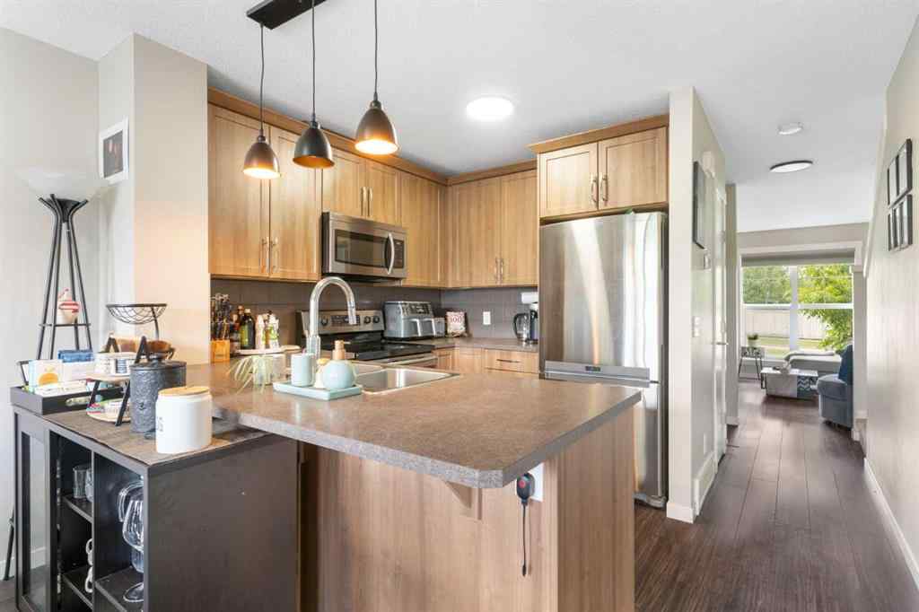 MLS® A2240361 - Unit #711 101 Sunset Drive  in Sunset Ridge Cochrane, Residential