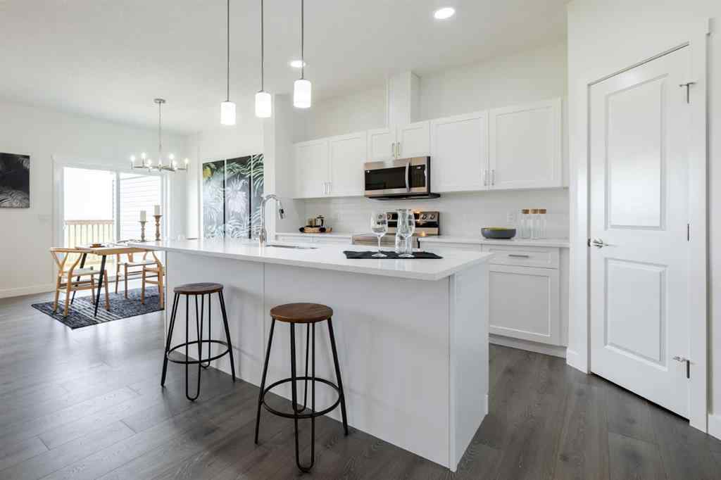 MLS® A2240365 - 67 Heritage Manor  in Heritage Hills Cochrane, Residential